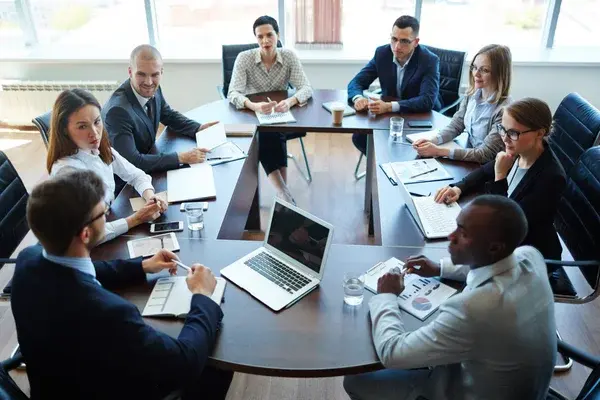 depositphotos 125885510 stock photo businespeople during discussion in board